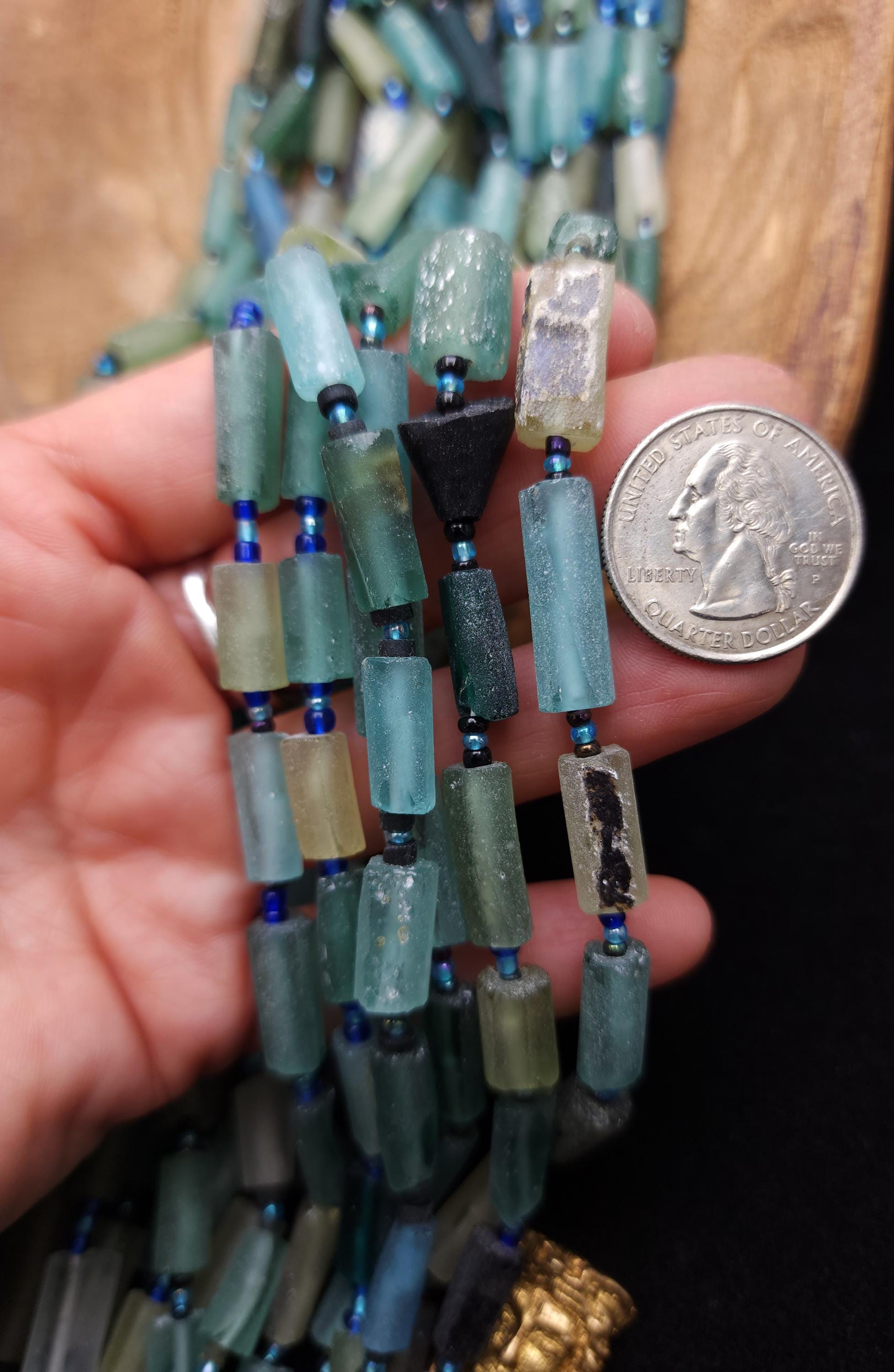 Antique Tube Roman Glass, with a rich history of over 15 centuries, offers a unique material for creating exceptional jewelry pieces.