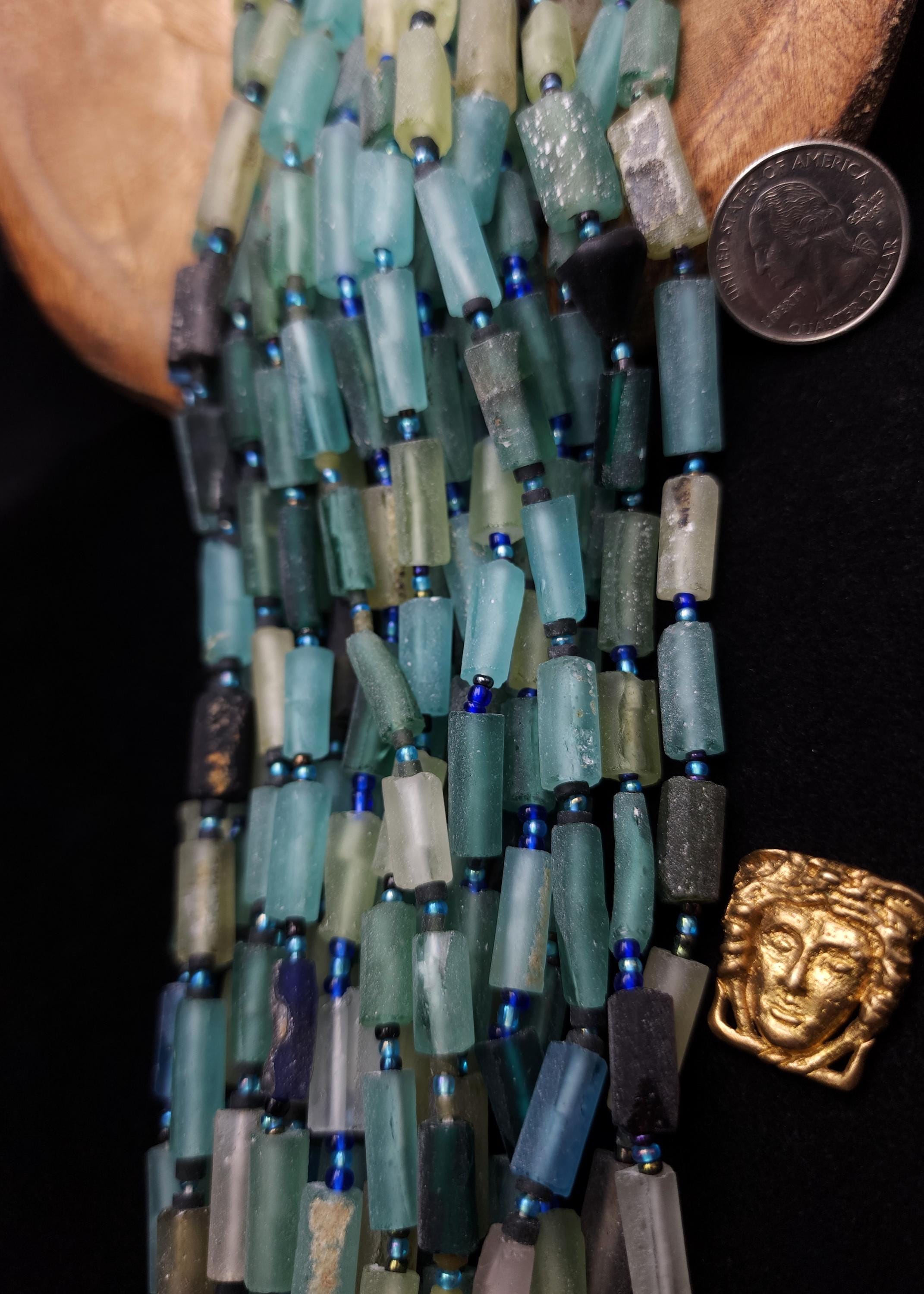 Antique Tube Roman Glass, with a rich history of over 15 centuries, offers a unique material for creating exceptional jewelry pieces.