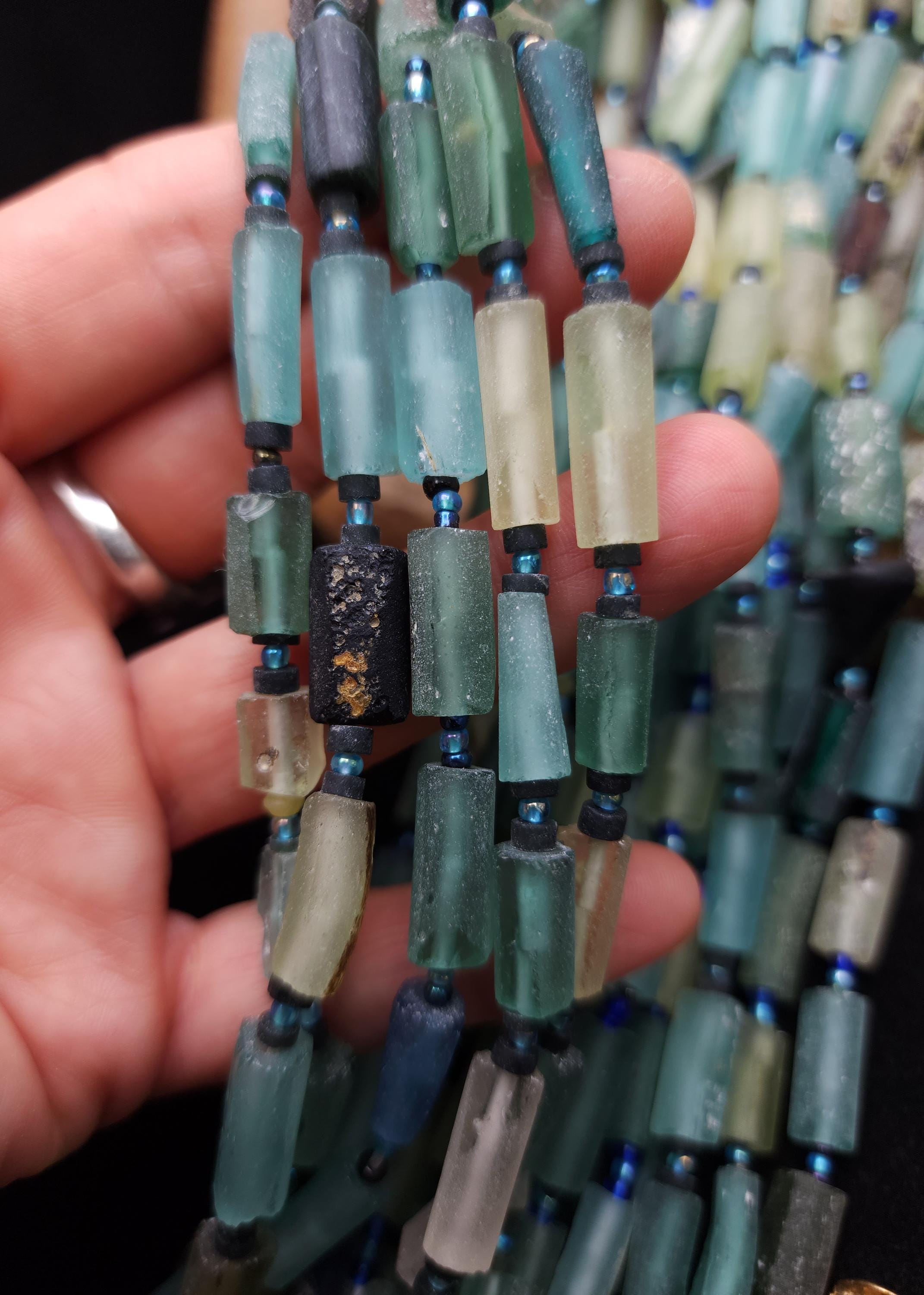 Antique Tube Roman Glass, with a rich history of over 15 centuries, offers a unique material for creating exceptional jewelry pieces.