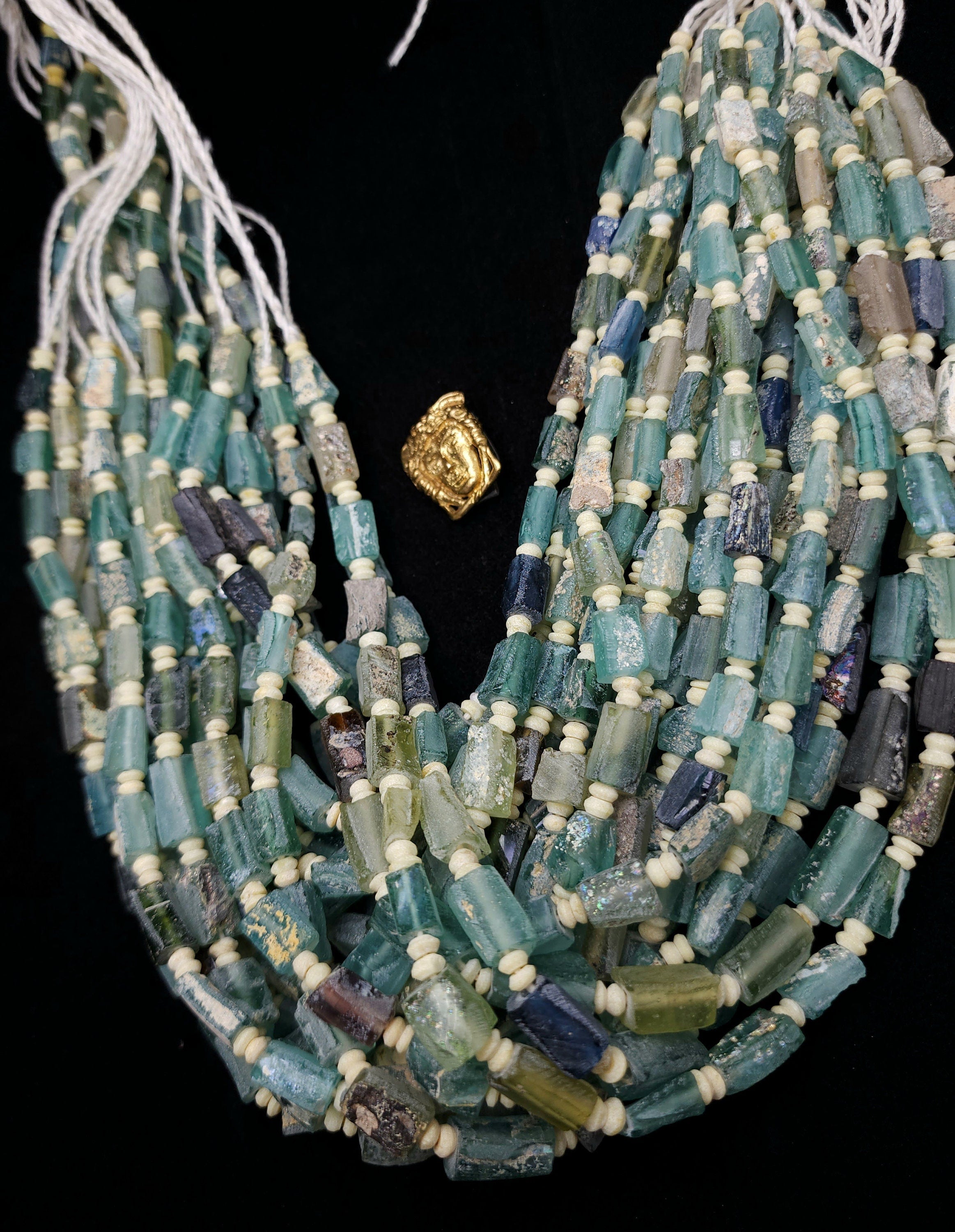 Antique Roman Glass, with a remarkable history spanning over 2000 years, this genuine glass is ideal for crafting exquisite jewelry.