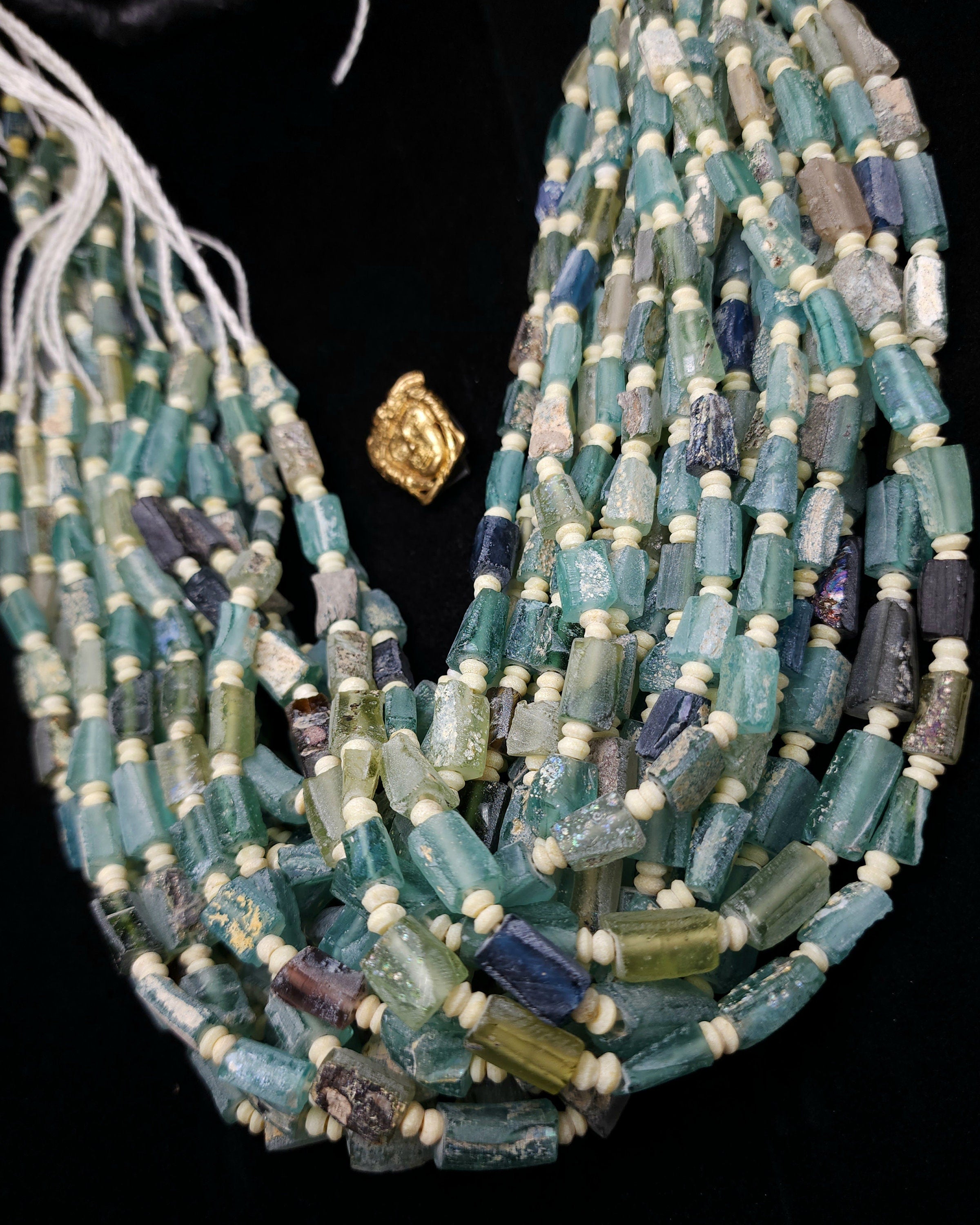 Antique Roman Glass, with a remarkable history spanning over 2000 years, this genuine glass is ideal for crafting exquisite jewelry.