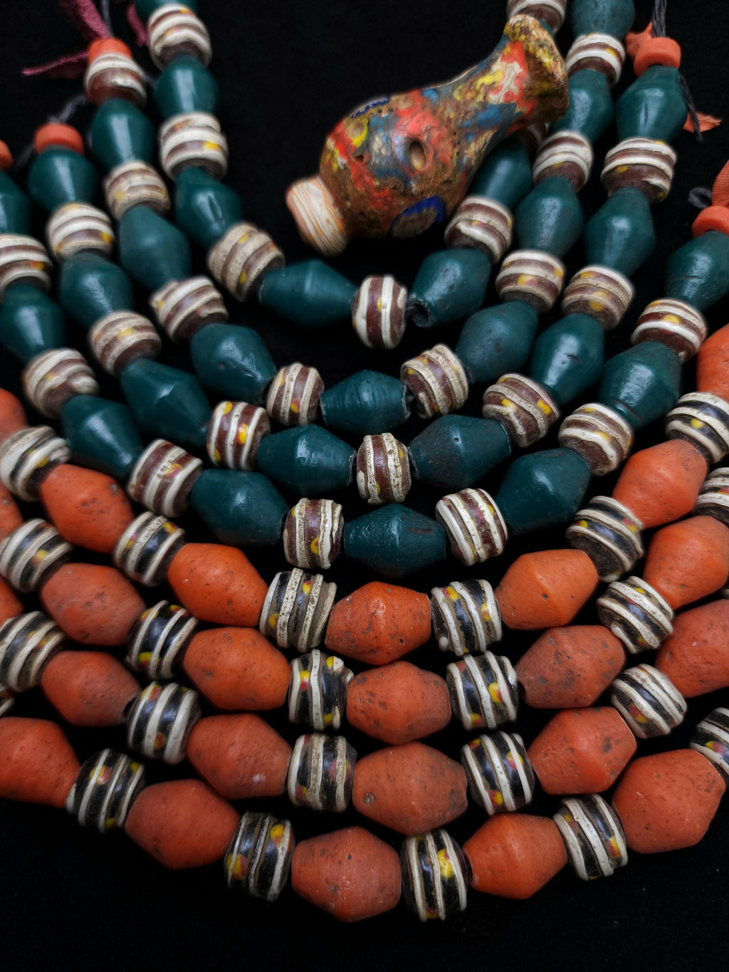 8" Strand [16 beads 9-12m] with a wide variety of beads with a rustic accent, Unique handmade glass beads from Indonesia, Jewelry Supplies